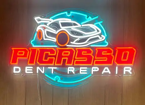Picasso Dent Repair technician working on a vehicle