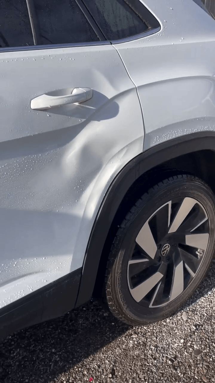 Before paintless dent repair