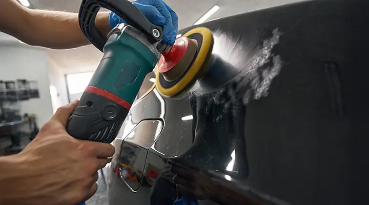 Professional scratch repair on vehicle paint